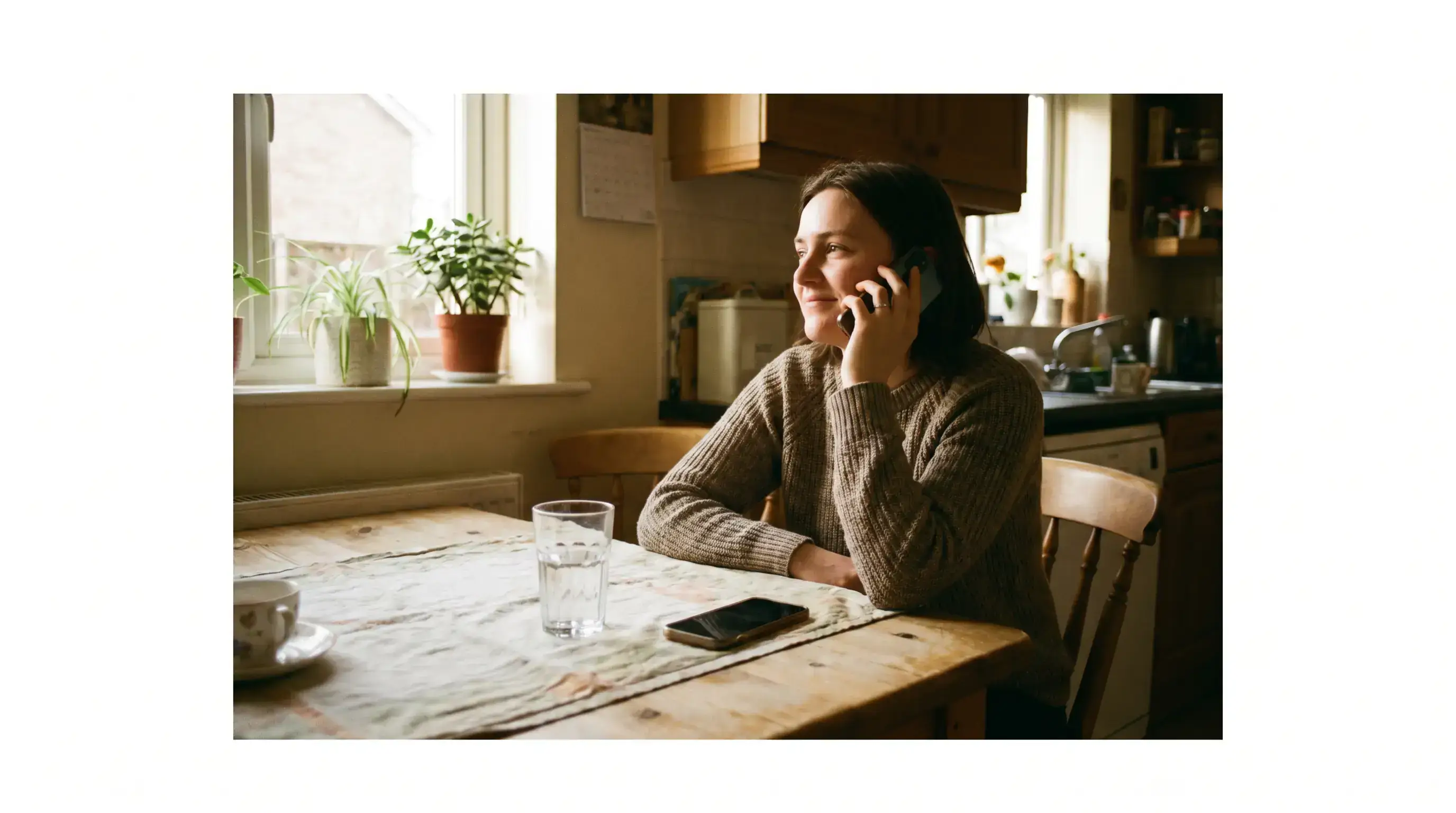 A person reaching out for confidential UK gambling support, with BeGambleAware and GamCare signposting